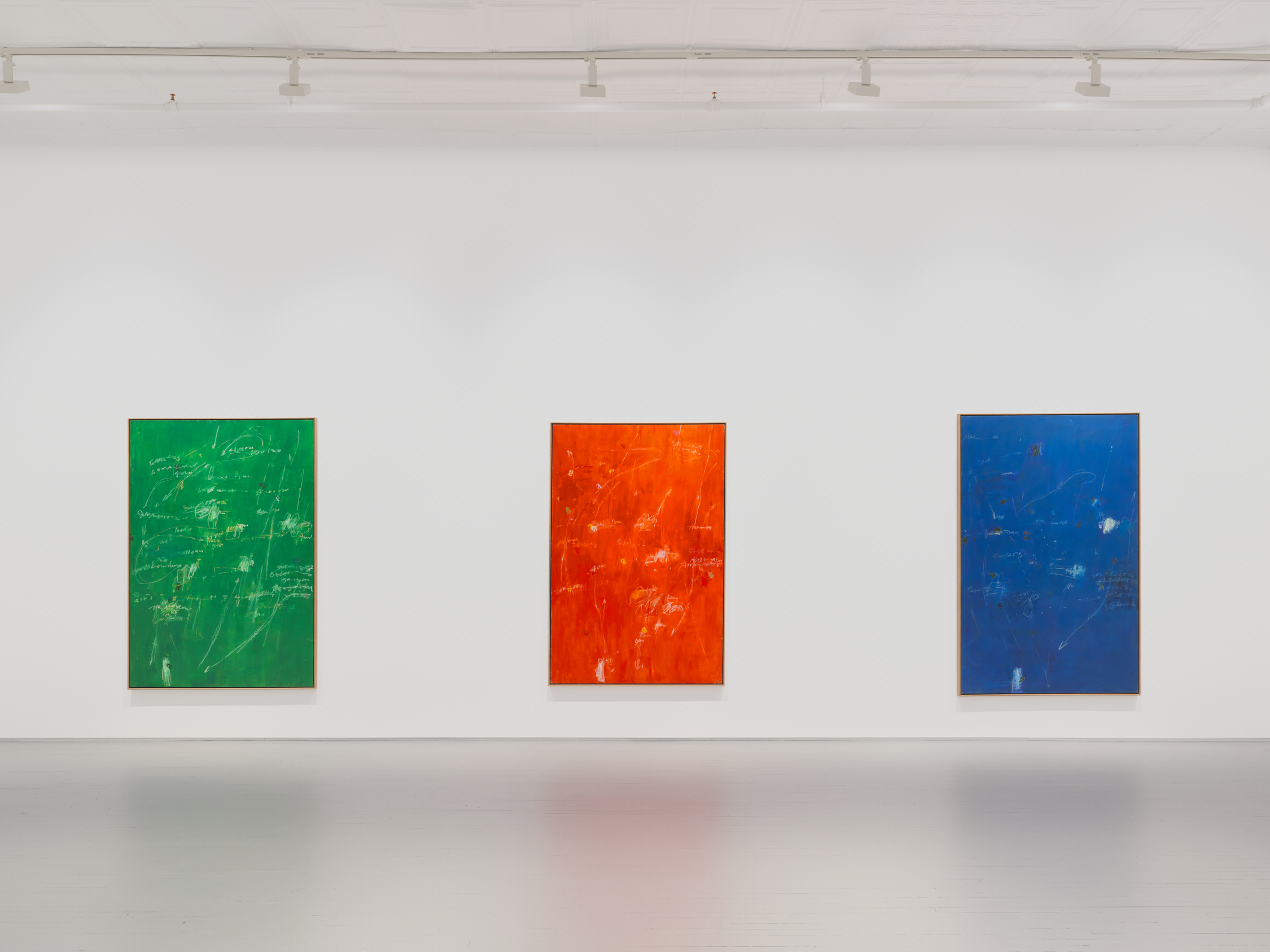 Watercolor artwork of nude figure against an off-white backdrop, jumping away from the viewer, holding a sickle in their hand with their other fist pressed towards the sky.